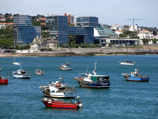 Boats moored in Cascais marina Portugal where boat insurance is essential for berthing
