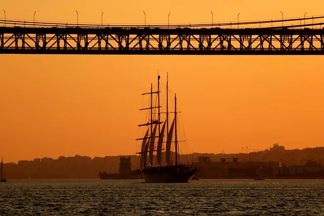 Traditional sailing ship navigating the Portuguese coast requiring comprehensive maritime insurance