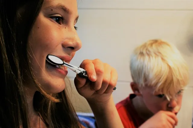 brush teeth representing dental insurance options in Portugal